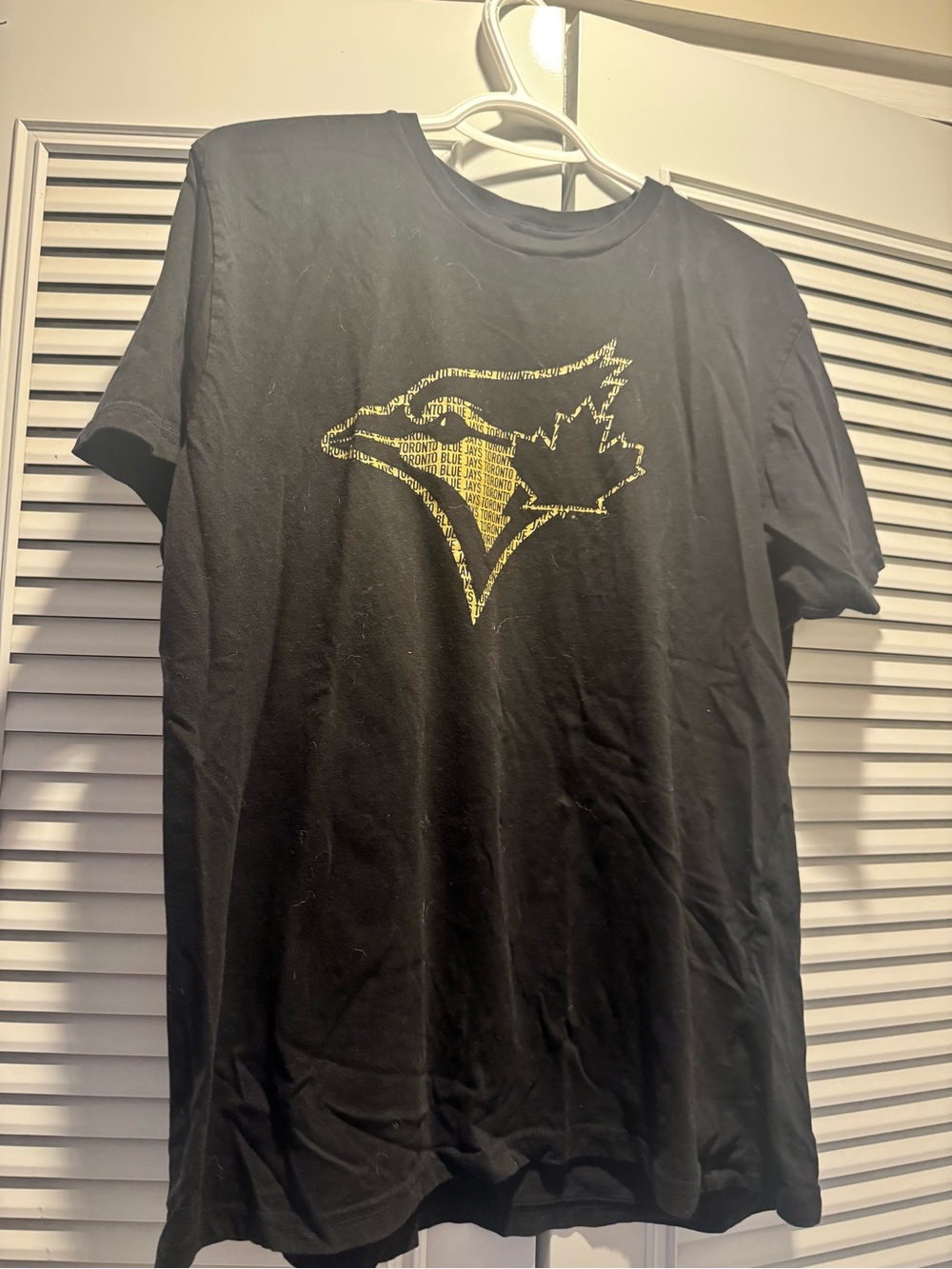Genuine Merchandise Blue Jays Black Tee with Gold Crest